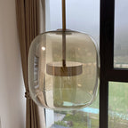 Vintage bursztynowa lampa wisząca ze złotymi detalami – ciepłe światło