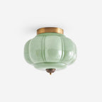 Szklana lampa sufitowa w kolorze jadeitowej zieleni z złotą ramą