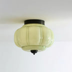Szklana lampa sufitowa w kolorze jadeitowej zieleni z złotą ramą