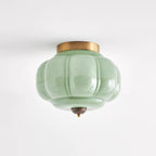 Szklana lampa sufitowa w kolorze jadeitowej zieleni z złotą ramą
