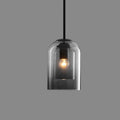 Designerskie lampy sufitowe – lampa wisząca z podwójnym kloszem w stylu mid-century