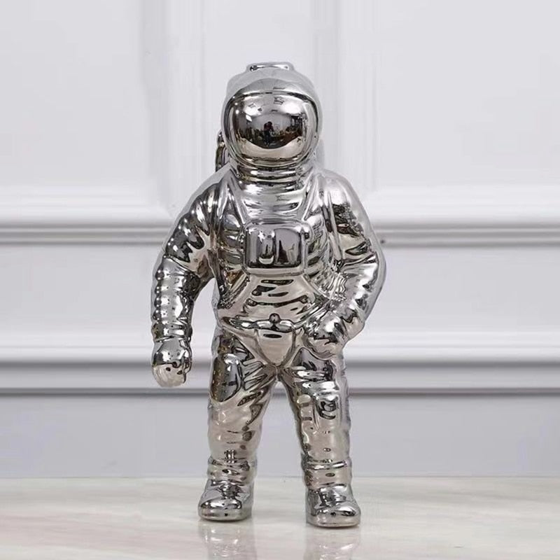 Wazon z figurką astronauty: nowoczesny akcent wystroju w stylu kosmicznym