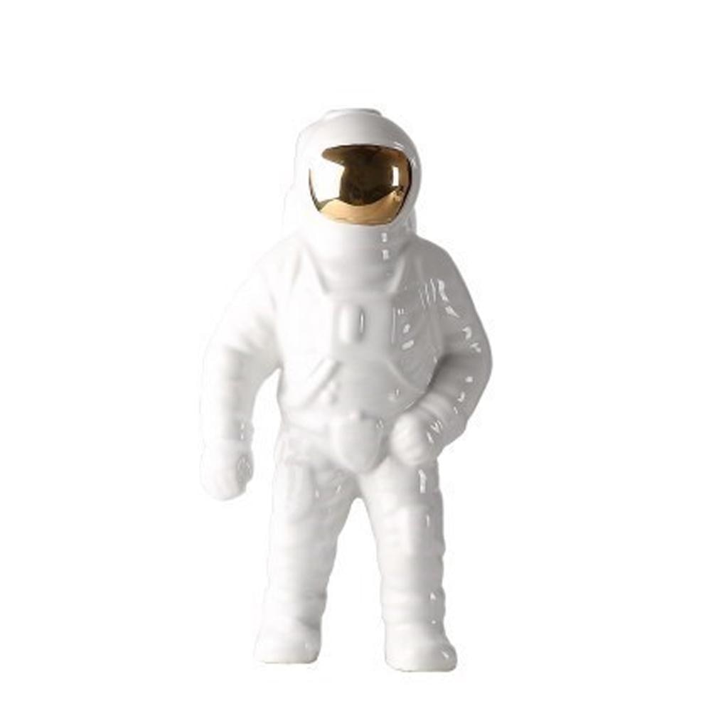 Wazon z figurką astronauty: nowoczesny akcent wystroju w stylu kosmicznym